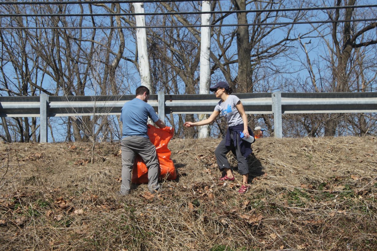 Volunteers collect trash as part of the Musconetcong River Volunteer Cleanup initiative